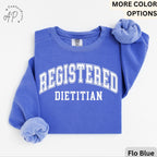 May include: A blue sweatshirt with the text "REGISTERED DIETITIAN" in white.